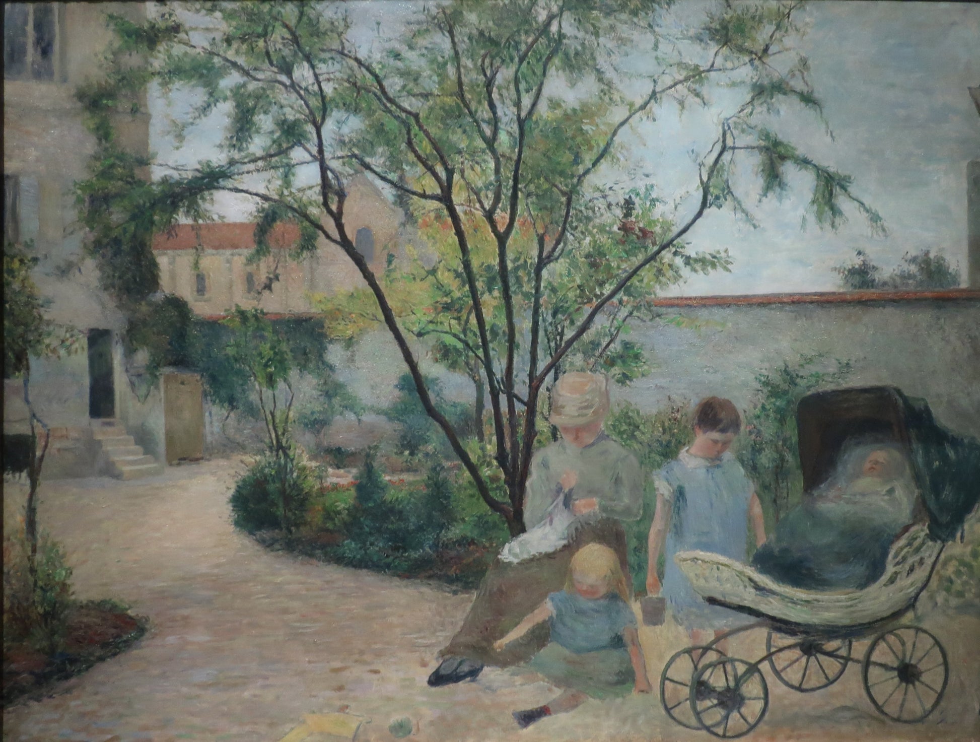 Målarkonstnärens familj i trädgården, rue Carcel - Paul Gauguin