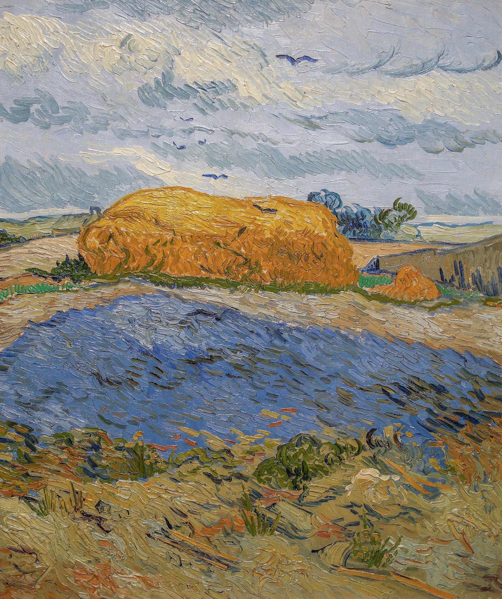 Höbalar under en regnig himmel - Vincent van Gogh