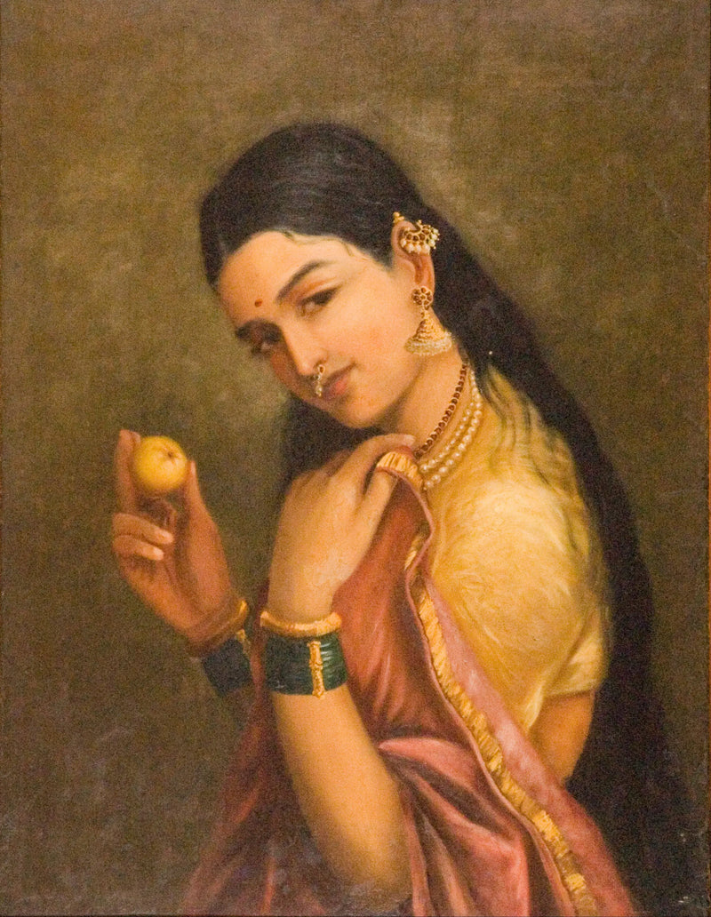 Kvinna som håller ett frukt - Ravi Varmâ