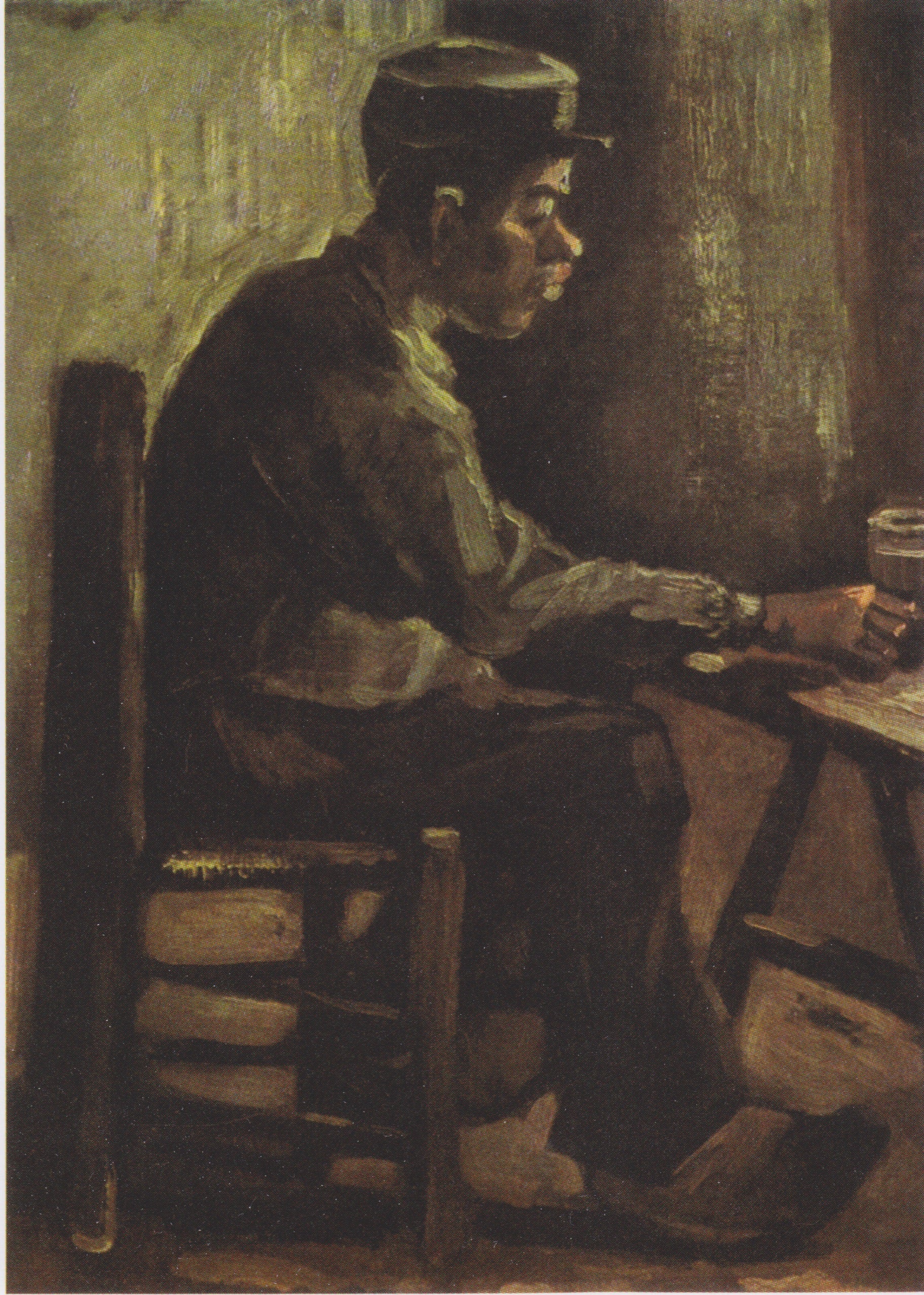 Man vid ett bord - Vincent van Gogh