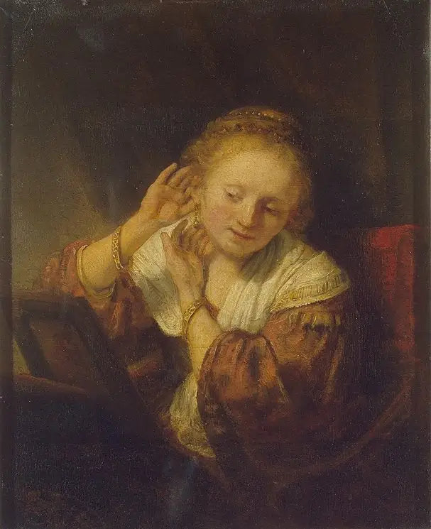Ung kvinna med örhängen - Rembrandt