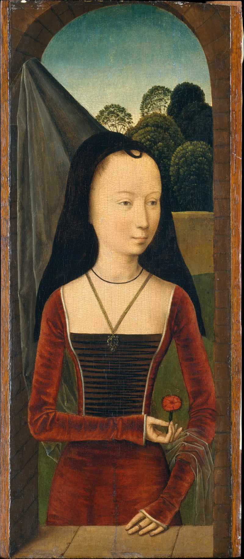 Ung kvinna med en ros - Hans Memling