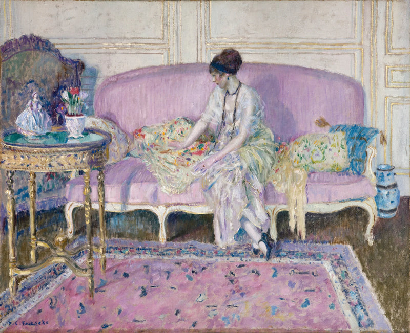 Kvinna sittande på en soffa inomhus - Frederick Carl Frieseke