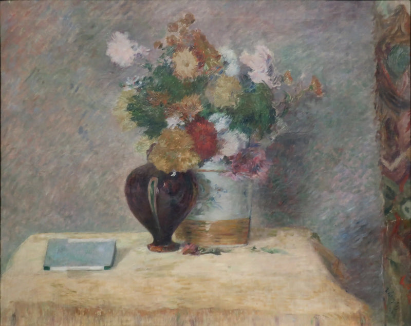 Blommor och japansk bok på ett bord - Paul Gauguin