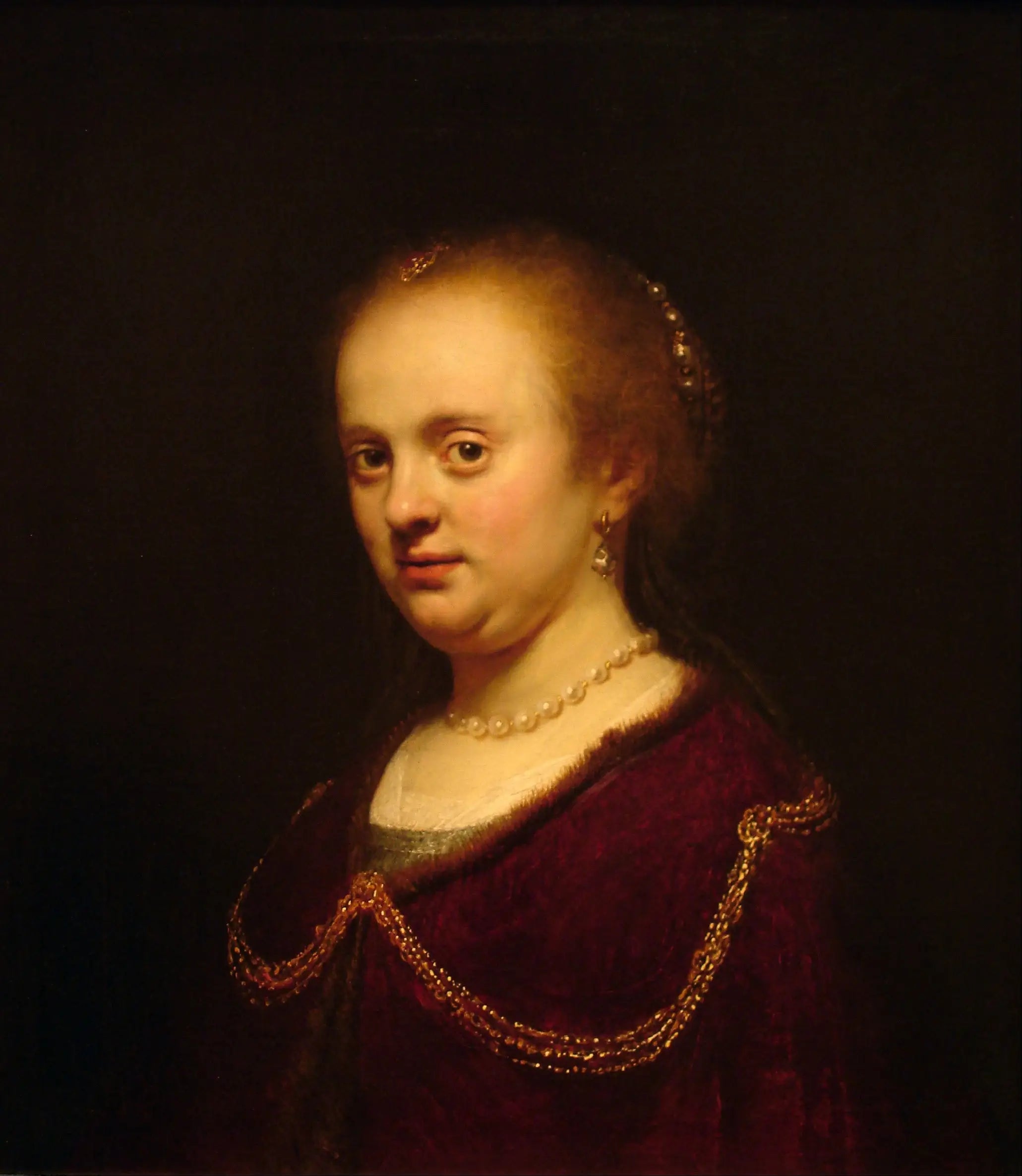 Reproduction du tableau « Jeune femme avec une chaîne en or - Rembrandt » par Alpha Reproduction en peinture à l’huile