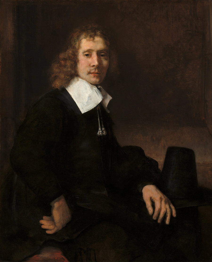 En ung man som sitter vid ett bord (kanske Govaert Flinck) - Rembrandt