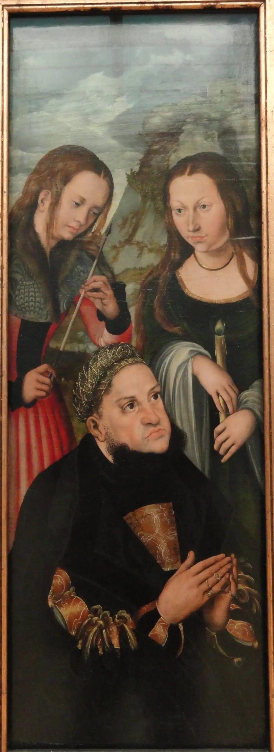 Frédéric le Sage de Saxe (1463-1525) med helgonet Ursula (till vänster) och Geneviève (till höger) - Lucas Cranach den äldre