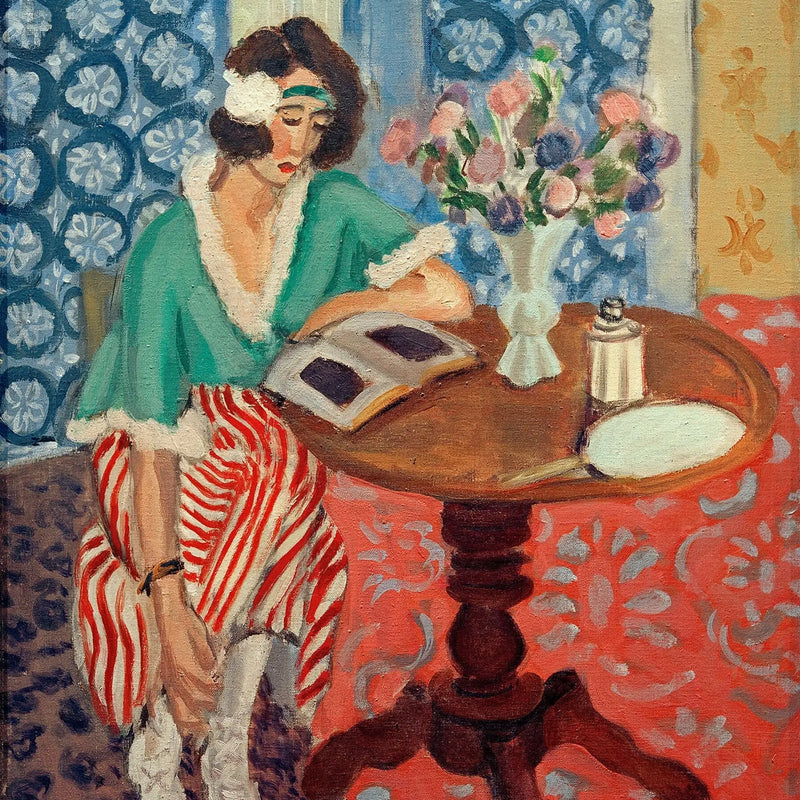 Ljusläsare vid sidobord - Henri Matisse