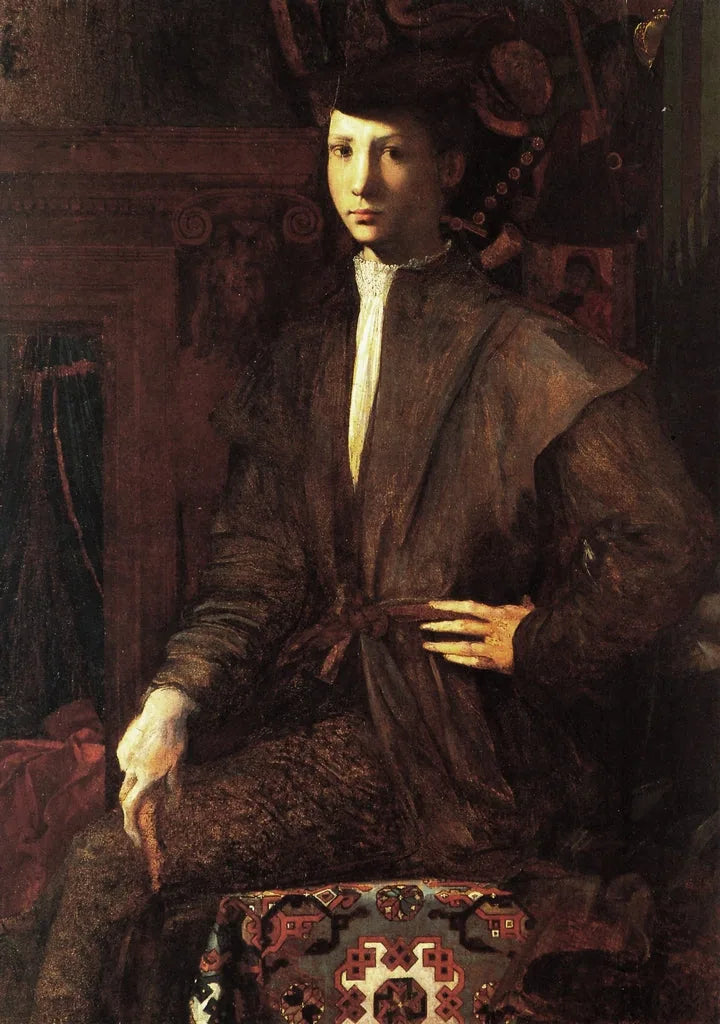 Porträtt av en ung man som sitter på en matta - Rosso Fiorentino