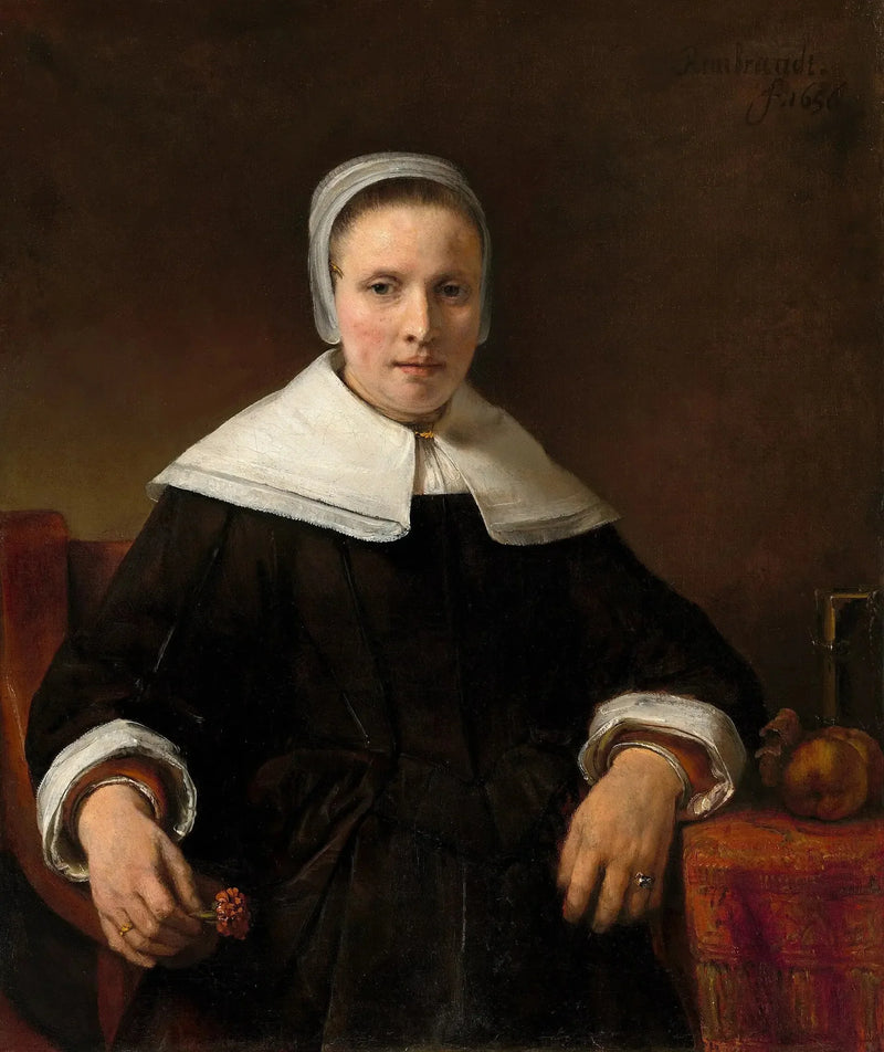 En kvinna som håller en ros - Rembrandt