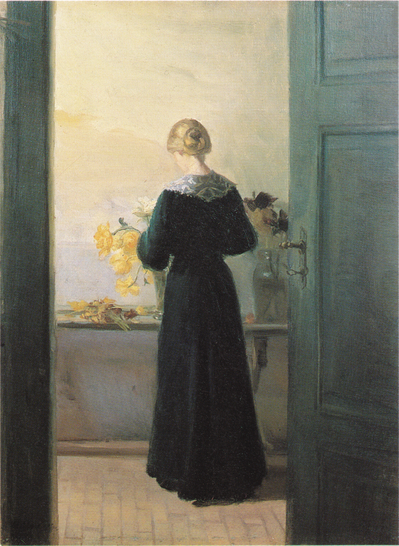 En ung kvinna arrangerar blommor - Anna Ancher