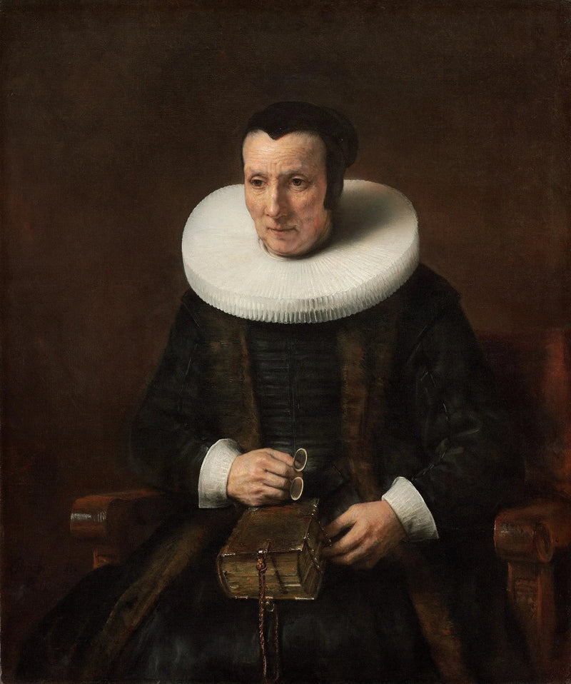 En gammal dam med en bok - Rembrandt