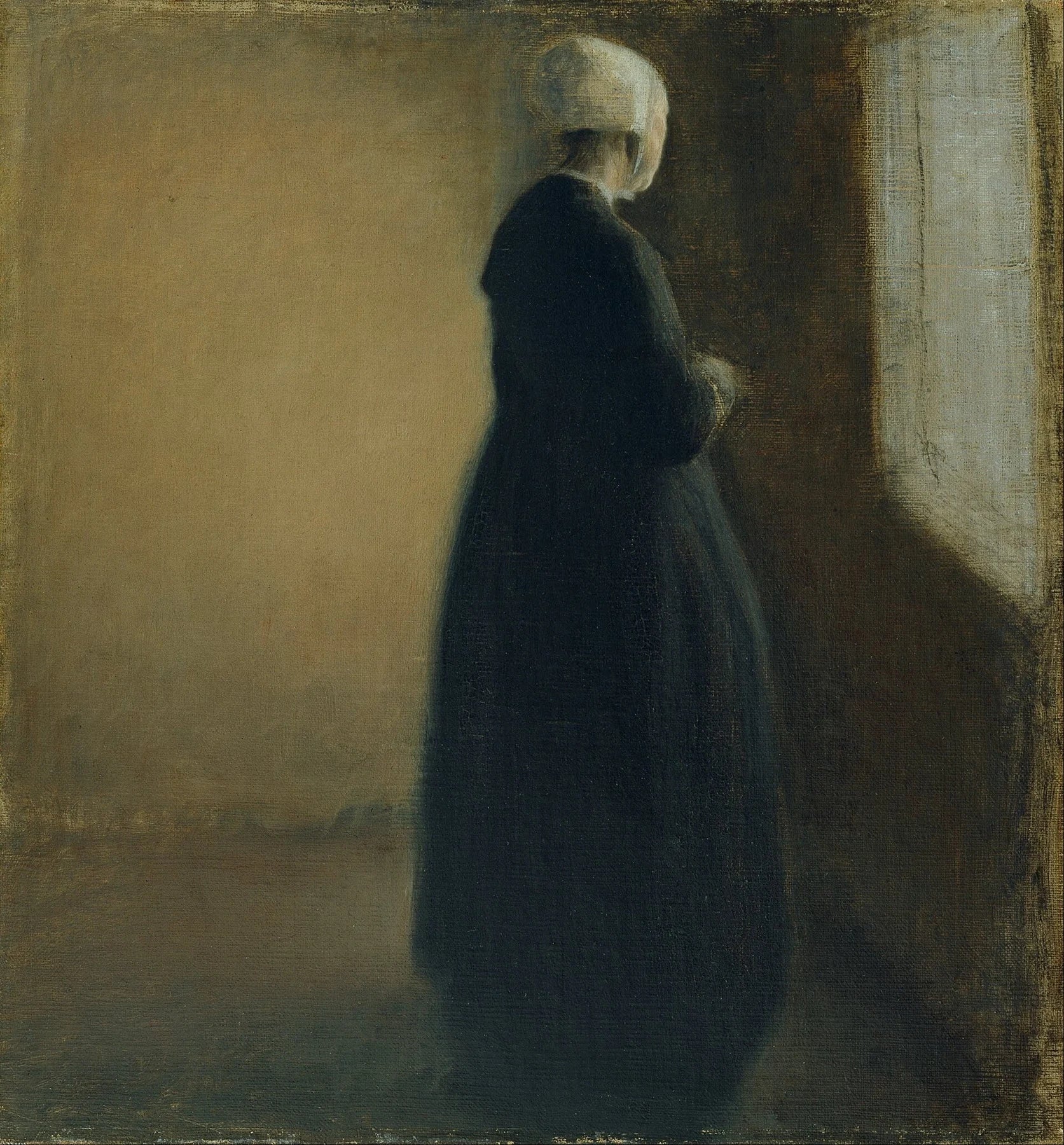 Vieille femme debout près d’une fenêtre, peinture de Vilhelm Hammershøi