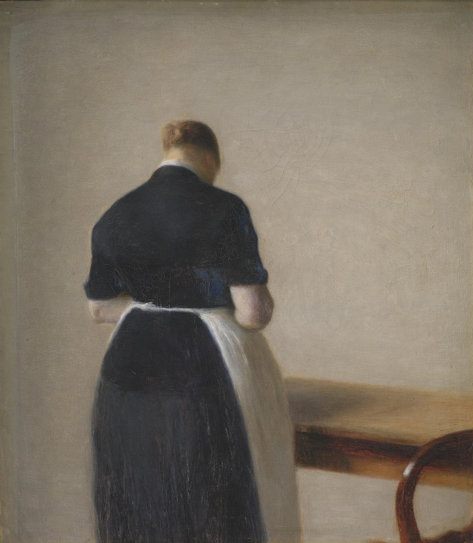 Femme vue de dos, peinture de Vilhelm Hammershøi